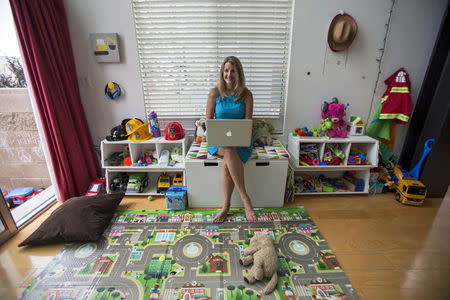 Chief executive of California-based social and educational group for parents Club MomMe Rachel Pitzel poses for a picture at her home in Playa Vista, California, June 10, 2015. REUTERS/Mario Anzuoni