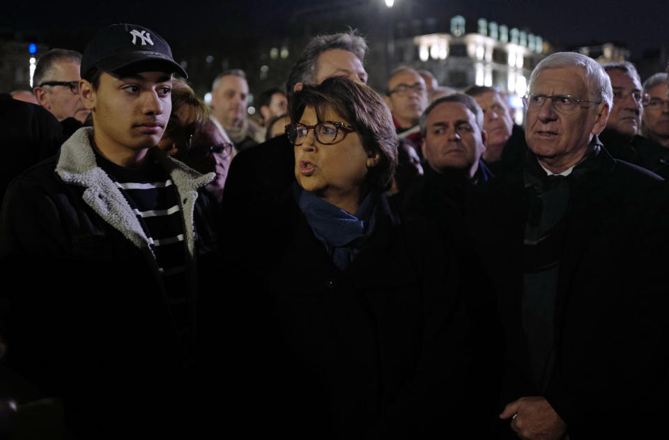 Mayor of Lille, Martine Aubry, centre, joins others during a march, in Lille, northern France, Tuesday, Feb. 19, 2019. French residents and public officials from across the political spectrum geared up Tuesday for nationwide rallies against anti-Semitism following a series of anti-Semitic acts, including the swastikas painted on about 80 gravestones at a Jewish cemetery overnight. (AP Photo/Michel Spingler)