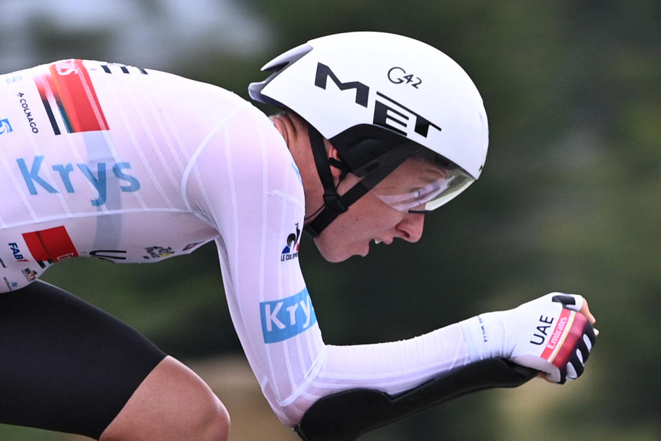 TOPSHOT - Team UAE Emirates' Tadej Pogacar of Slovenia rides during the 5th stage of the 108th edition of the Tour de France cycling race, a 27 km time trial between Change and Laval, on June 30, 2021. (Photo by Anne-Christine POUJOULAT / AFP) (Photo by ANNE-CHRISTINE POUJOULAT/AFP via Getty Images)