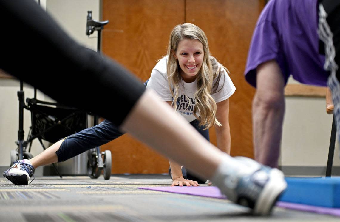 Brittany Kunkel leads a set of stretches during an Elevated Function class on Tuesday, July 9, 2024 at Calvary Church.