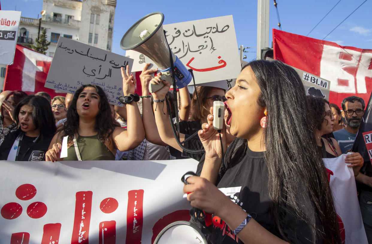 Tunisian take part in a protest against President Kais Saied ahead of the upcoming presidential elections, Friday, Sept. 13, 2024, on Avenue Habib Bourguiba in the capital Tunis. (AP Photo/Anis Mili)