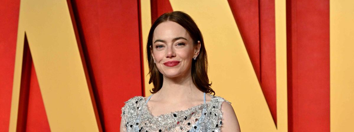 Emma Stone's exposed bra look is making *business sexy* a thing