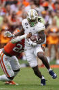 Georgia Tech running back Jahmyr Gibbs (1) is brought down by Clemson linebacker Trenton Simpson (22) in the first half of an NCAA college football game Saturday, Sept. 18, 2021, in Clemson, S.C. (AP Photo/John Bazemore)