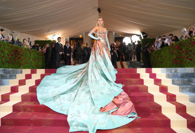 Met Gala 2022: Emma Stone is a vision in a white satin slip dress on her  way to the fashion event