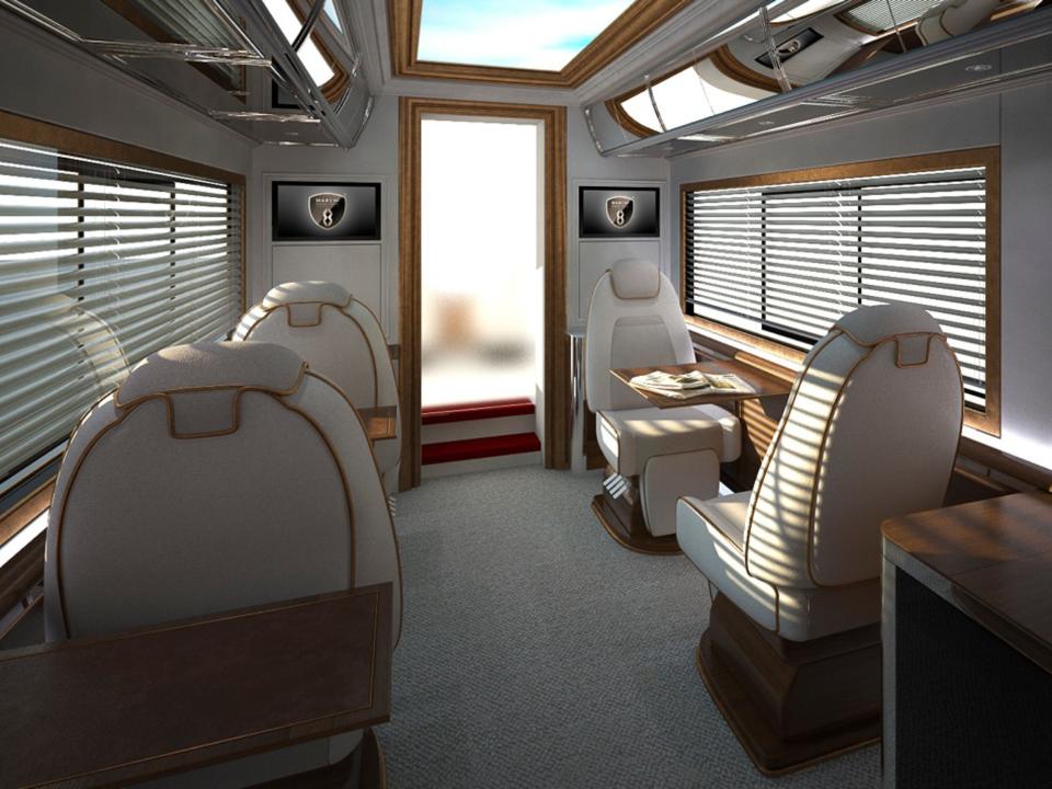 A rendering of the inside of one of Marchi Mobile's vehicles with seats facing each other