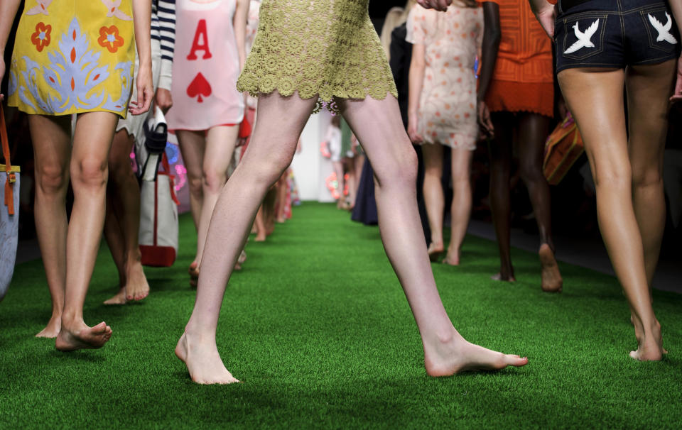 Models wear designs from the Jasper Conran Spring/Summer 2013 collection during London Fashion Week, Saturday, Sept. 15, 2012. (AP Photo/Jonathan Short)