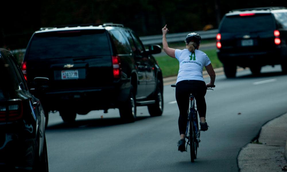 After Juli Briskman gave Trump’s motorcade the finger, her employer sacked her, citing her re-posting of the ‘obscene’ image on her Twitter account.