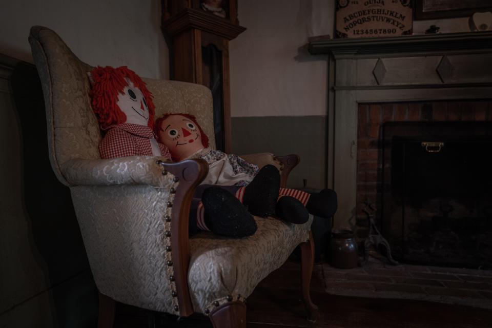 Raggedy Ann dolls are placed throughout the home, in reference to the haunted doll from the movie series.