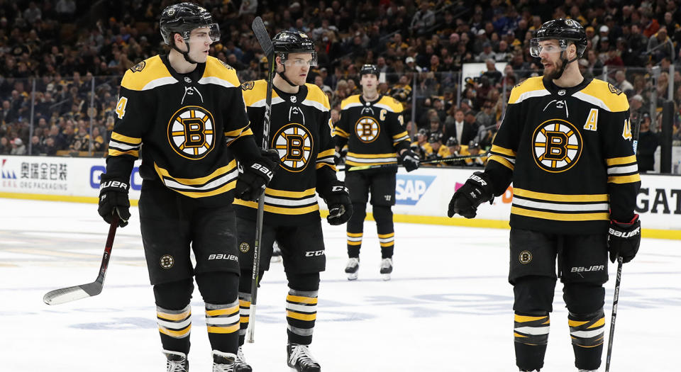 BOSTON, MA - APRIL 11: Boston Bruins center David Krejci (46) instructs Boston Bruins left wing Jake DeBrusk (74) and Boston Bruins center Karson Kuhlman (83) during Game 1 of the First Round between the Boston Bruins and the Toronto Maple Leafs on April 11, 2019, at TD Garden in Boston, Massachusetts. (Photo by Fred Kfoury III/Icon Sportswire via Getty Images)