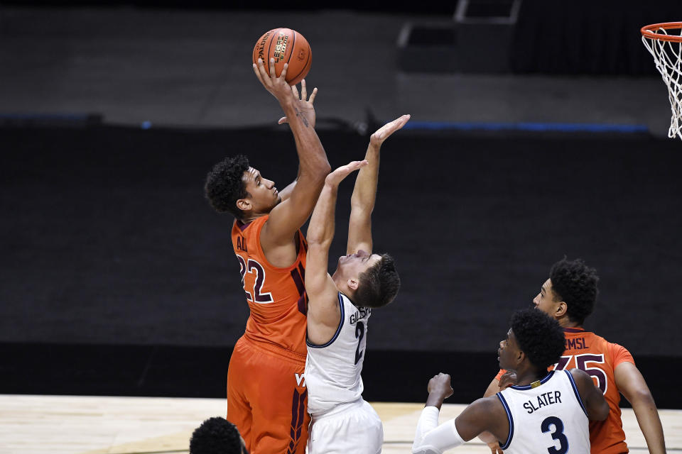 Virginia Tech's Keve Aluma shoots as Villanova's Collin Gillespie defends during the first half of an NCAA college basketball game Saturday, Nov. 28, 2020, in Uncasville, Conn. (AP Photo/Jessica Hill)