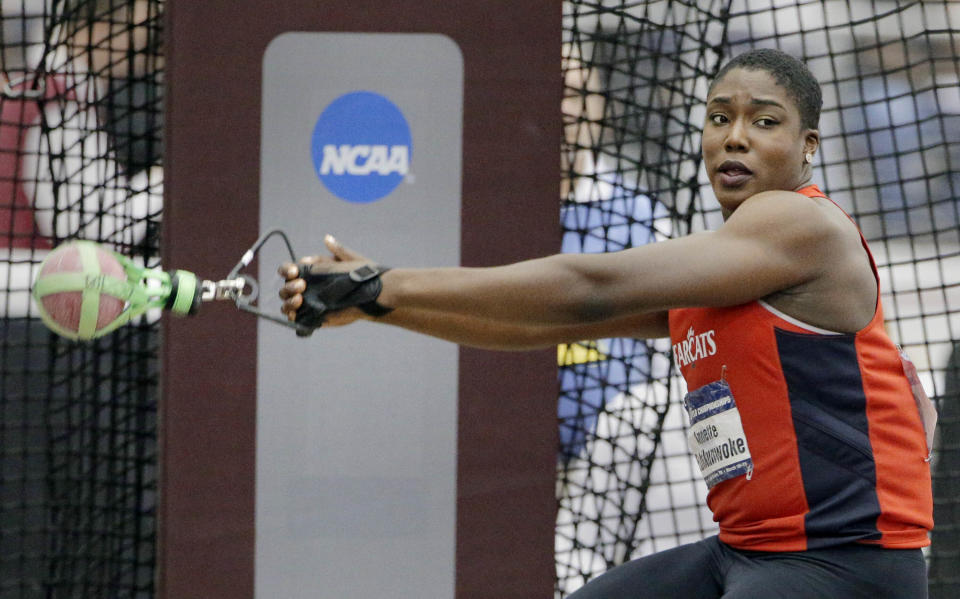 FILE - Cincinnati's Annette Echikunwoke wins the women's weight throw during the NCAA college indoor track and field championships Saturday, March 11, 2017, in College Station, Texas. Three days before the hammer thrower from Ohio was to compete and represent Nigeria at the Tokyo Olympics, she was informed she couldn't. Due to a federation glitch concerning drug testing. On her 25th birthday, no less.(AP Photo/Michael Wyke), File