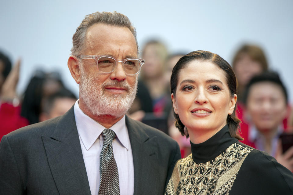 Actor Tom Hanks arrives with director Marielle Heller for the Gala Premiere of the film "A Beautiful Day In The Neighborhood" at the 2019 Toronto International Film Festival on Saturday, Sept. 7, 2019. (Frank Gunn/The Canadian Press via AP)