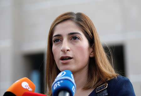 German journalist Mesale Tolu speaks to the media outside the Justice Palace, the Caglayan courthouse, in Istanbul, Turkey October 16, 2018. REUTERS/Kemal Aslan