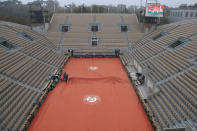 View of the empty seats on Suzanne Lenglen court as rain suspended most matches in the first round of the French Open tennis tournament at the Roland Garros stadium in Paris, France, Monday, Sept. 28, 2020. (AP Photo/Michel Euler)