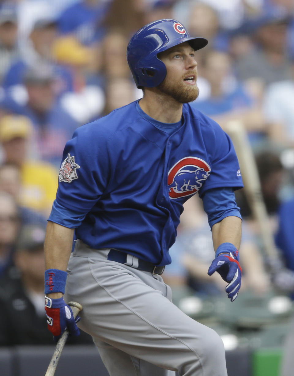 Chicago Cubs' Ben Zobrist watches his home run against the Milwaukee Brewers during the seventh inning of a baseball game Sunday, April 9, 2017, in Milwaukee. (AP Photo/Jeffrey Phelps)