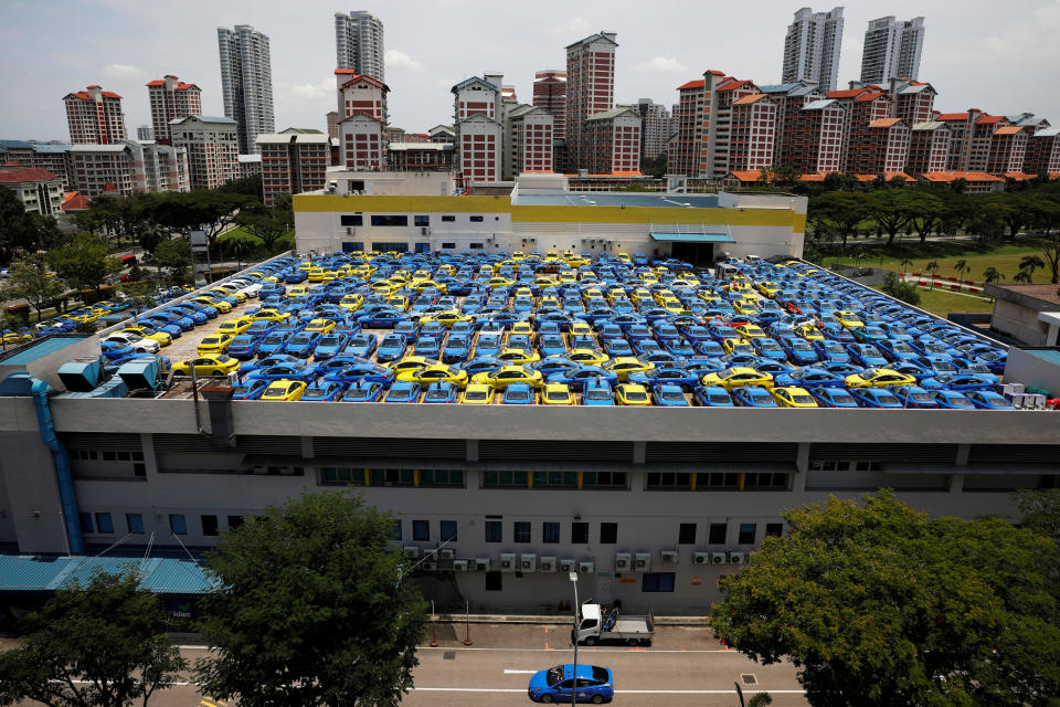 ComfortDelGro taxis are parked at their vehicle inspection yard on 9 October 2017. (Reuters file photo)