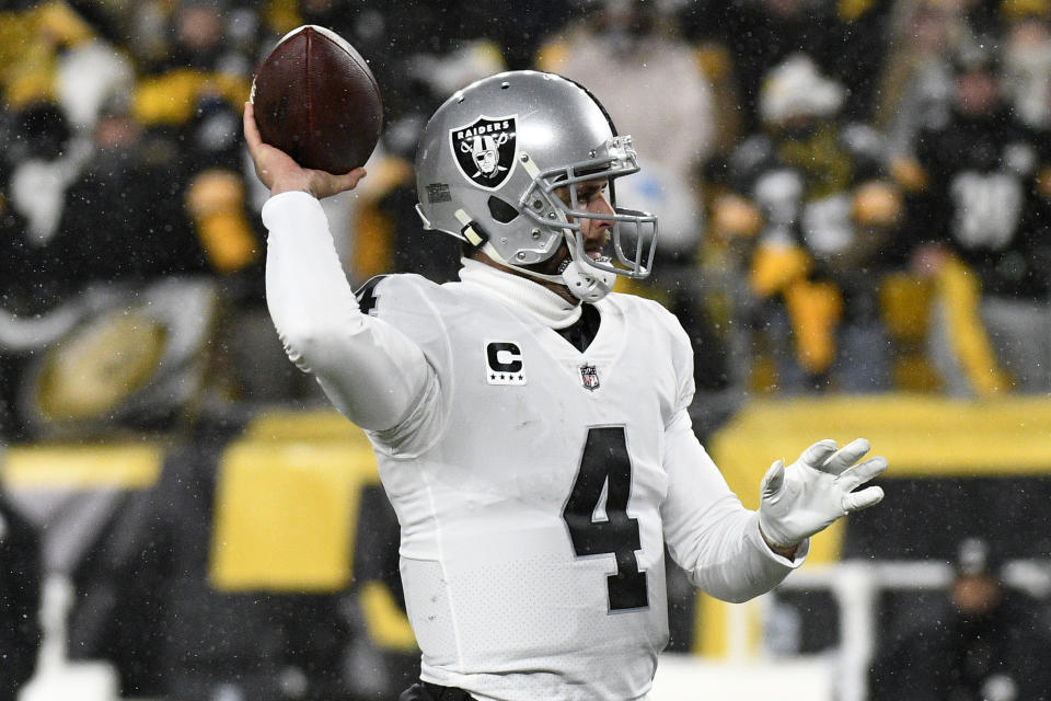 Las Vegas Raiders quarterback Derek Carr throws a pass during the first half of an NFL football game against the Pittsburgh Steelers in Pittsburgh, Saturday, Dec. 24, 2022. (AP Photo/Don Wright)