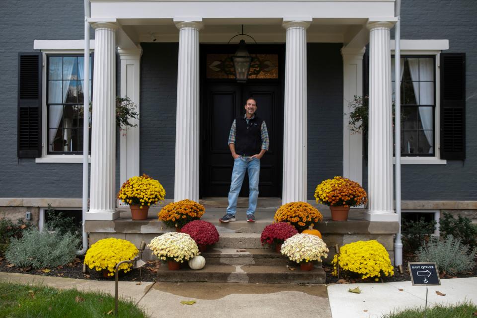 Drew Musser, owner, stands in front of The Willis-James Bed and Breakfast on October 18, 2023, in Chillicothe, Ohio.