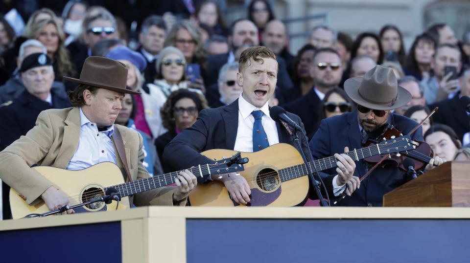 Musician Tyler Childers, center, performed during the inauguration for Gov. Andy Beshear on the steps of the Kentucky State Capitol building in Frankfort, Ky. on Dec. 13, 2023.