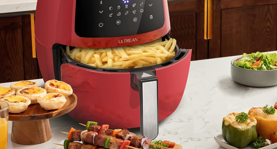 red ultrean air fryer with french fries, custard tarts, steak, stuffed peppers, amazon air fryer