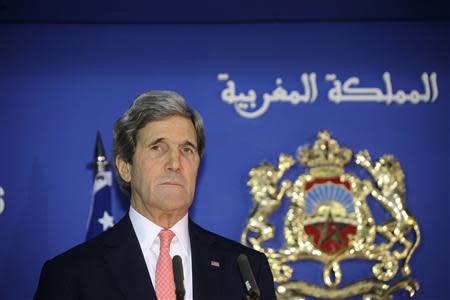 U.S. Secretary of State John Kerry speaks at a news conference with Moroccan Foreign Minister Salaheddine Mezouar following a bilateral strategic dialogue at the Foreign Ministry in Rabat, April 4, 2014. REUTERS/Stringer