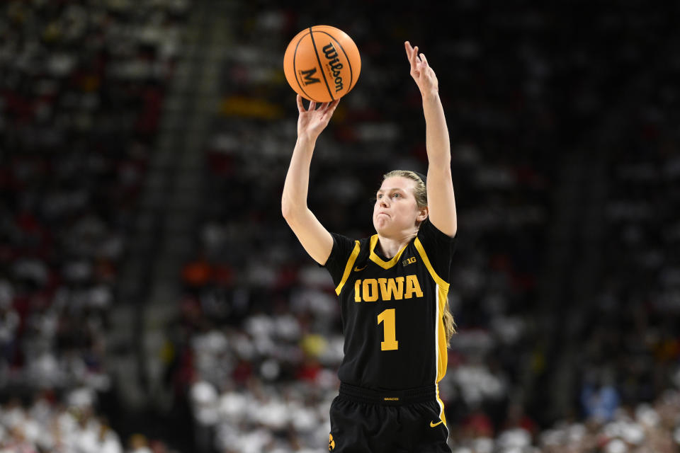 Iowa guard Molly Davis shoots during the first half of an NCAA college basketball game against Maryland, Saturday, Feb. 3, 2024, in College Park, Md. (AP Photo/Nick Wass)