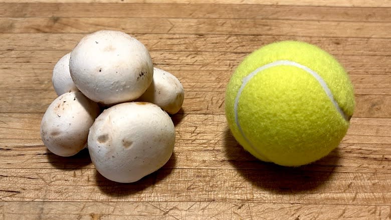 Mushrooms and tennis ball