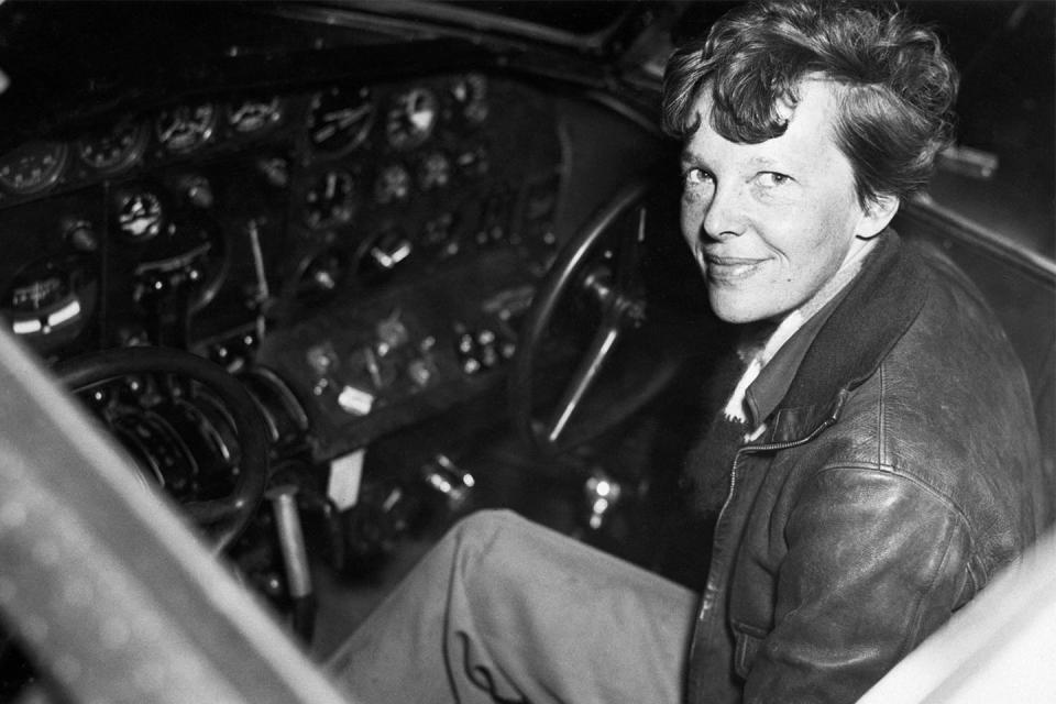 <p>Amelia Earhart sits in the cockpit of her Lockheed Electra right before embarking on her second attempt to circle the equator. Earhart and her co-pilot Fredrick Noonan would not return from this voyage.</p>