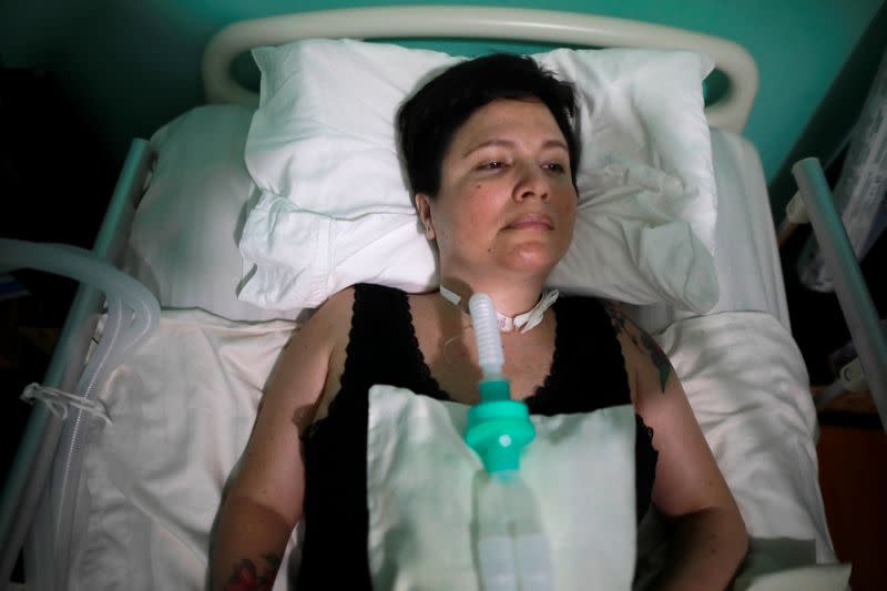 Ana Estrada, a euthanasia advocate who suffers from an incurable condition, lies in bed at her home in Lima