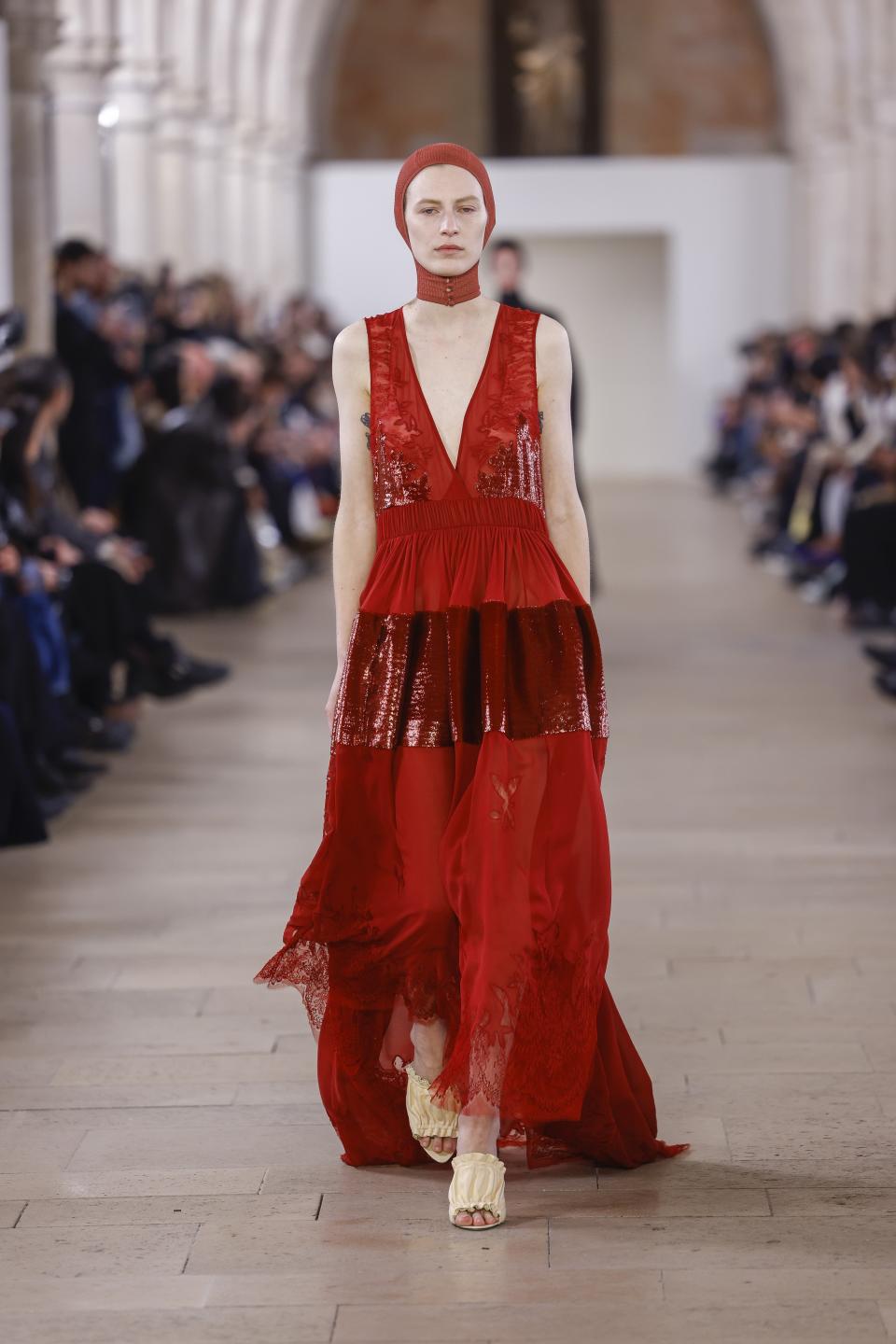 A model wears a creation as part of the Lanvin Fall/Winter 2023-2024 ready-to-wear collection presented Sunday, March 5, 2023 in Paris. (Vianney Le Caer/Invision/AP)