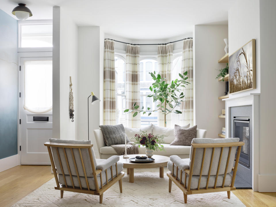 a living room with no separate entryway