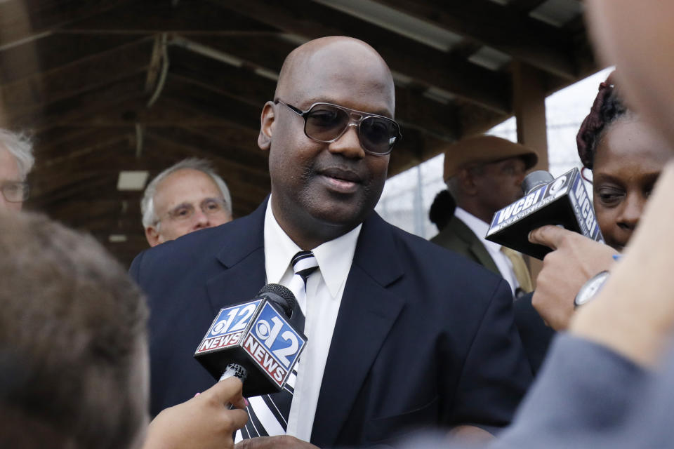 Curtis Flowers speaks with reporters as he exits the Winston-Choctaw Regional Correctional Facility in Louisville, Miss., Monday, Dec. 16, 2019. Flowers' murder conviction was overturned by the U.S. Supreme Court for racial bias was he was granted bond by a circuit judge and is free, with a number of conditions for the first time in 22 years. (AP Photo/Rogelio V. Solis)