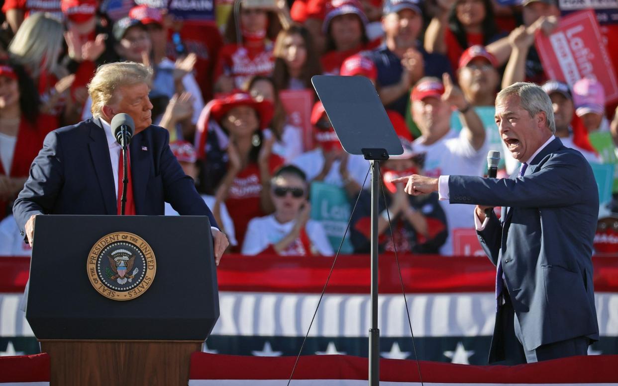 Nigel Farage praises President Donald Trump during a campaign rally at Phoenix Goodyear Airport - Chip Somodevilla/Getty Images