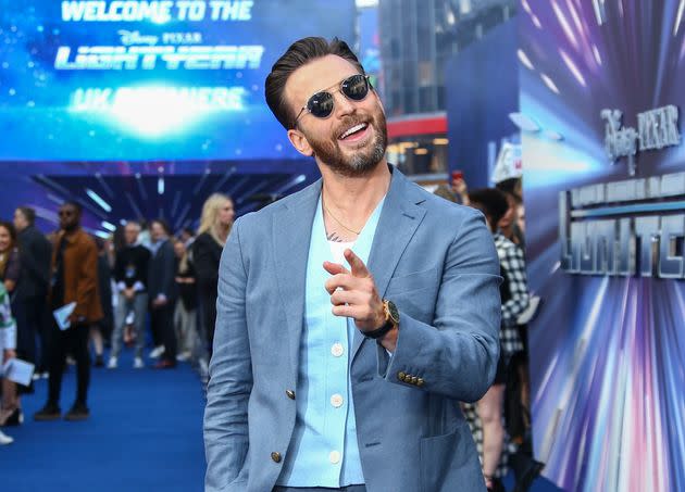 Chris Evans poses for photographers at the premiere of the film 