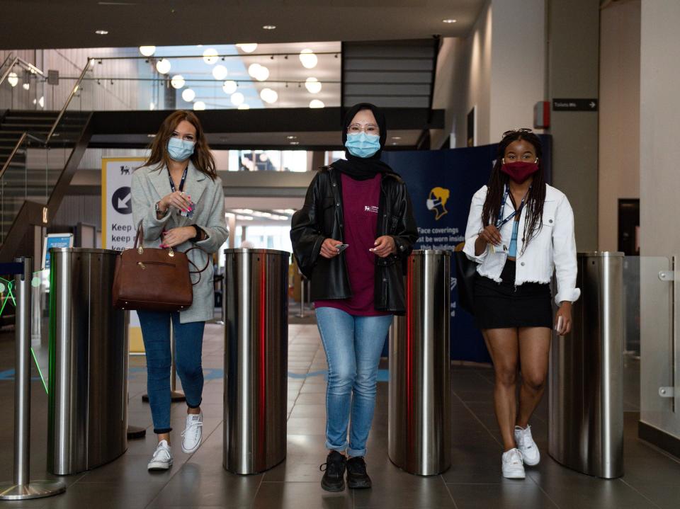 Students at Birmingham City University arrive for the start of term, as thousands prepare to study in socially distanced surroundings. (Jacob King/PA)