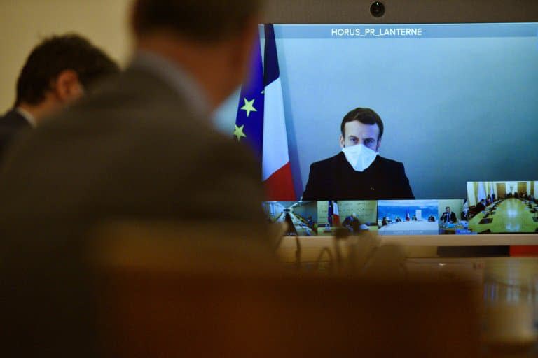 Emmanuel Macron lors d'un Conseil des ministres en visioconférence le 21 décembre 2020 à Paris - Julien DE ROSA © 2019 AFP