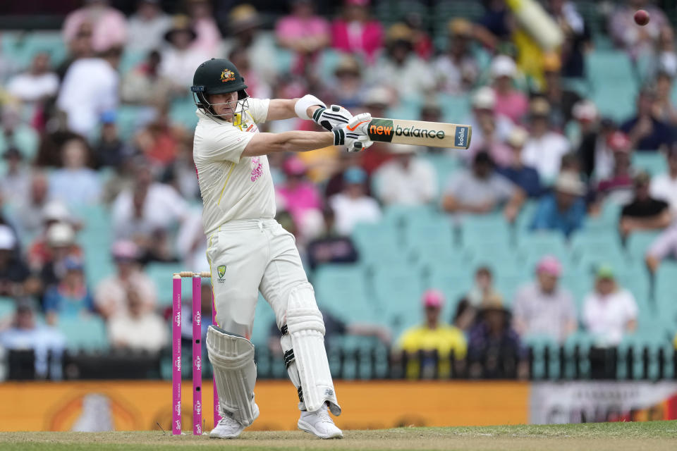 Australia's Steve Smith drives the ball to the boundary off South Africa's Marco Jansen during the second day of their cricket test match at the Sydney Cricket Ground in Sydney, Thursday, Jan. 5, 2023. (AP Photo/Rick Rycroft)