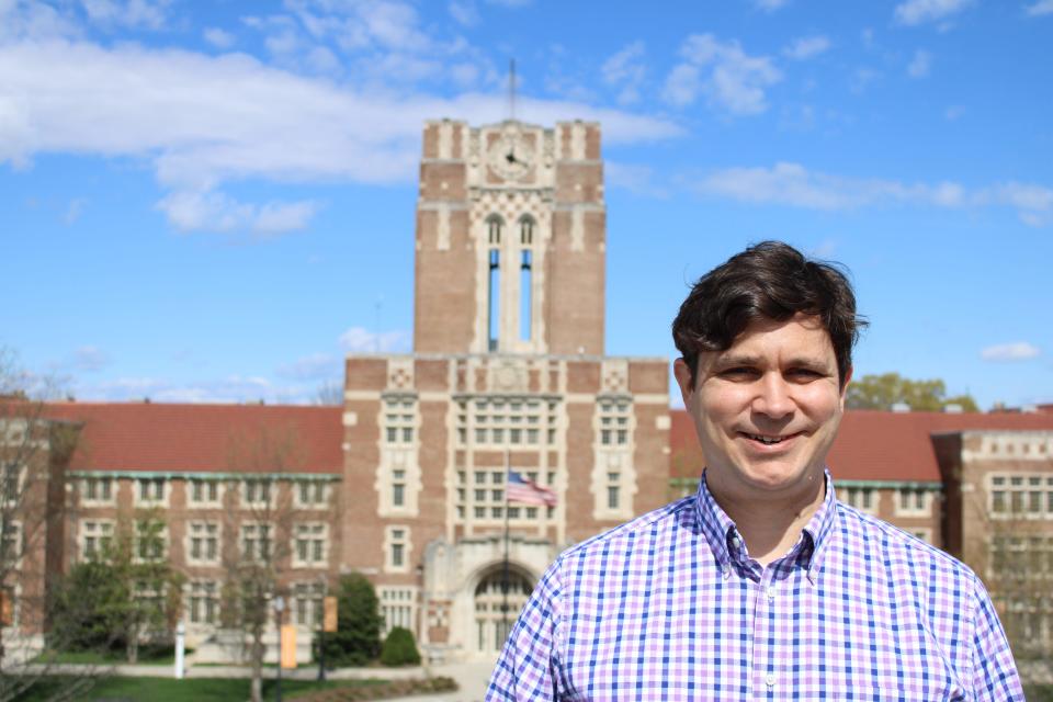 Senior lecturer and astronomy coordinator Sean Lindsay poses on top of the Nielsen Physics building at the University of Tennessee. March 18, 2024.
