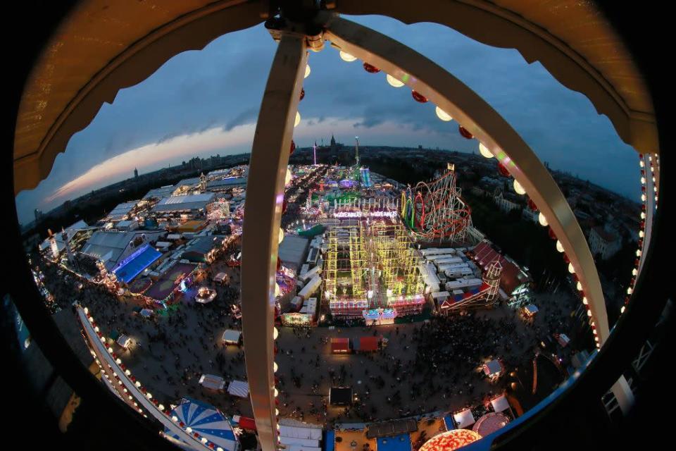 A view of the Oktoberfest beer festival, seen from the giant ferris wheel in the dusk of the first day on September 22.