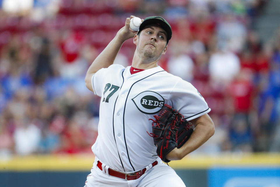 Cincinnati Reds starting pitcher Trevor Bauer throws in the first inning of a baseball game against the Chicago Cubs, Friday, Aug. 9, 2019, in Cincinnati. (AP Photo/John Minchillo)