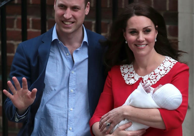 Britain's Prince William, seen here with Kate and his baby son Louis, will be best man at his brother Harry's wedding