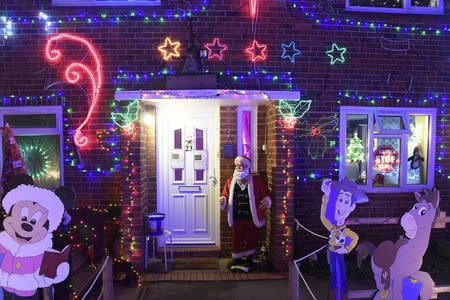 A home is decorated with a display of Christmas of lights in a tradition that has grown over recent years in the small village of Westfield in Sussex, south east England, December 15, 2016. Picture taken on December 15. REUTERS/Toby Melville