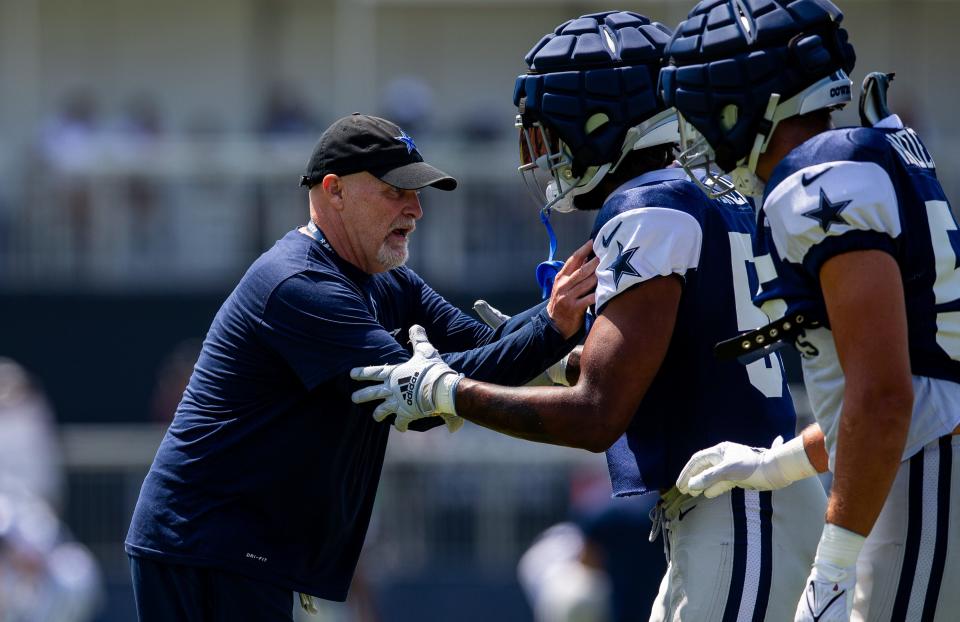 Dan Quinn, left, is an old school, defensive-minded coach. Sound familiar?