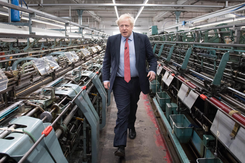 Prime Minister Boris Johnson during a visit to the John Smedley Mill, while election campaigning in Matlock, Derbyshire.