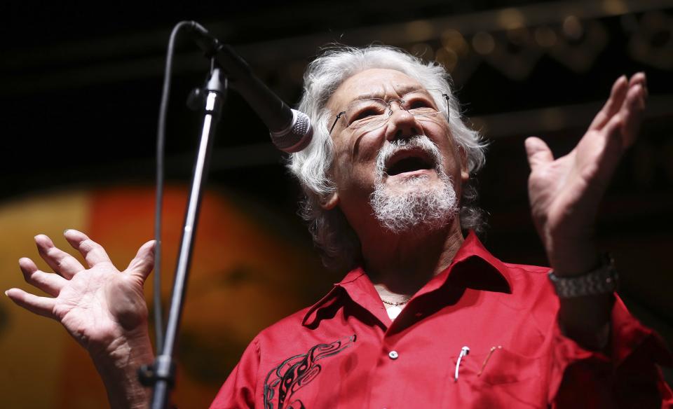 Environmental activist David Suzuki addresses the media before musician Neil Young's "Honor The Treaties" concert series at the Centennial Concert Hall in Winnipeg, Manitoba, January 16, 2014. Young is touring to raise money for the Athabasca Chipewyan First Nation aboriginal group, which is trying to prevent the expansion of tar sands development. REUTERS/Trevor Hagan (CANADA - Tags: POLITICS ENTERTAINMENT ENVIRONMENT ENERGY SOCIETY)