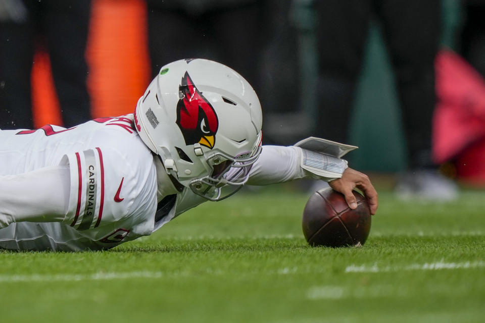 Arizona Cardinals quarterback Kyler Murray recovers his own fumble during the first half of an NFL football game against the Philadelphia Eagles, Sunday, Dec. 31, 2023, in Philadelphia. (AP Photo/Matt Slocum)