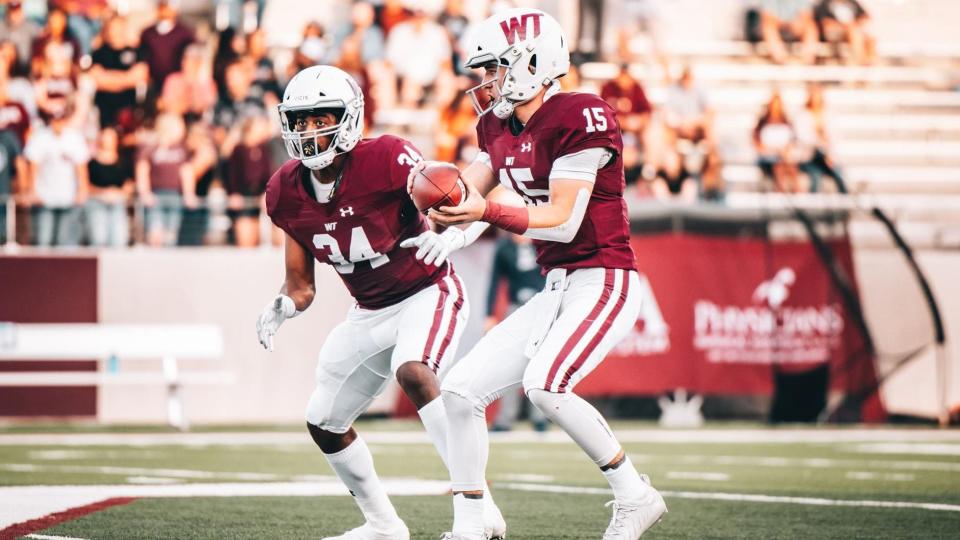 West Texas A&M's Nick Gerber (15) and Khalil Harris (34) have been part of the main offensive core for the Buffs during the fall 2021 season.