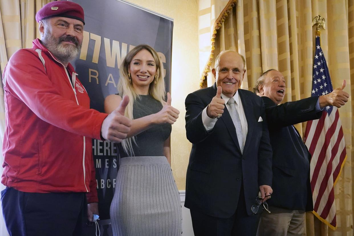 (left to right) Guardian Angels founder and New York Republican mayoral candidate Curtis Sliwa, Manhattan GOP chairwoman Andrea Catsimatidis, former New York Mayor Rudy Giuliani and businessman John Catsimatidis pose for a group photograph during a press conference at the Women's Republican Club, Wednesday, Sept. 16, 2020, in New York. 