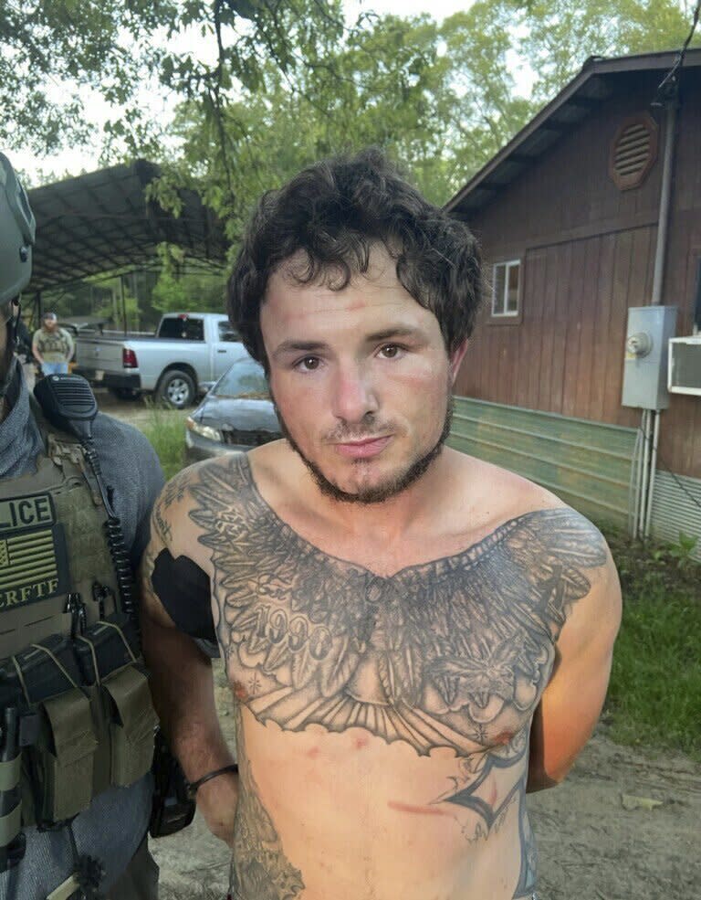 This photo provided by Hinds County Sheriff's office shows Corey Harrison taken into custody Thursday, May 4, 2023 in Crystal Springs, Miss. Harrison and three other inmates escaped from the Raymond Detention Center near Jackson, Mississippi’s capital, on April 22, officials said.(Hinds County Sheriff's office via AP)