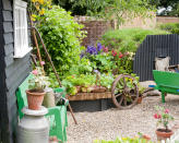 <p> A garden doesn't have to use all of your outdoor space. If you want more of a backyard setup where you can relax, you can still grow veg as well – just allocate a sunny border for your edibles. If your plot doesn't have any soil, build a corner raised bed to make one.  </p>